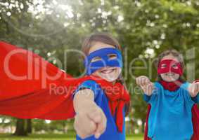 Superhero kids with trees background