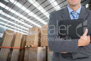 man in suit in warehouse