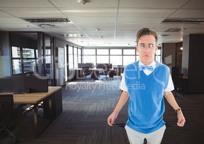 sad young man with empty pocket. In the office