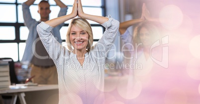 Business people with prayer position standing in office