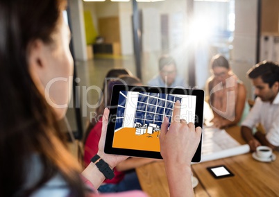 young workers group (start up). woman with tablet and on it the new office design.(color: blue and o
