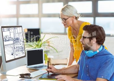 young man and woman working on the computer on the new office design ( white and dark blue)