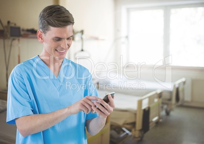 Doctor on mobile phone in hospital room