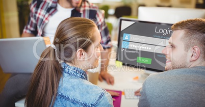 Business people with login screen on computer and digital laptop working in office