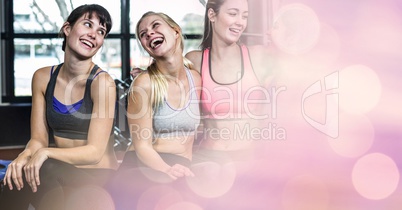 Athletes relaxing in gym