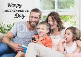 Smiling american family sitting on a couch