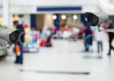 CCTV cameras against defocused background