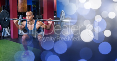 Man weightlifting and blue bokeh transition