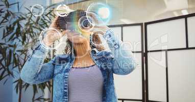 Digital composite image of woman wearing VR glasses