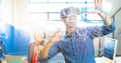 Businessman using VR in office
