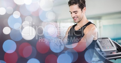 Fit young man standing at gym