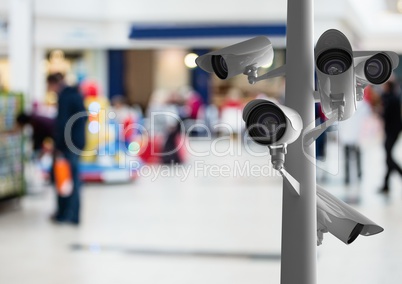 CCTV cameras against defocused background