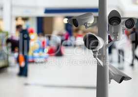 CCTV cameras against defocused background