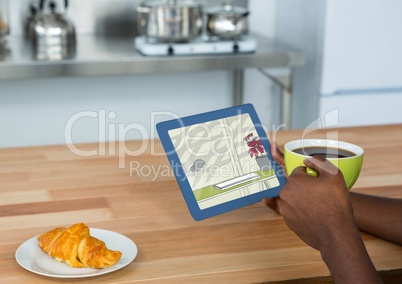 breakfast with tablet with the draw of the design  of the new office (color: green and red)