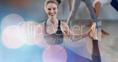 Happy woman exercising in gym