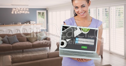 Portrait of beautiful woman holding laptop with login screen while standing at home