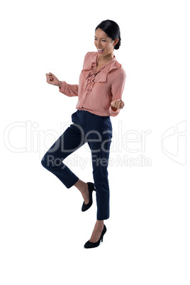 Female executive gesturing against white background