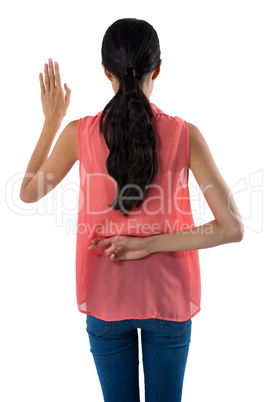 Woman gesturing against white background