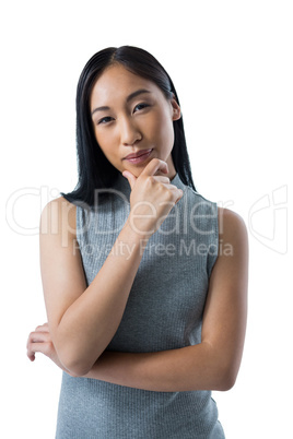 Woman standing against white background