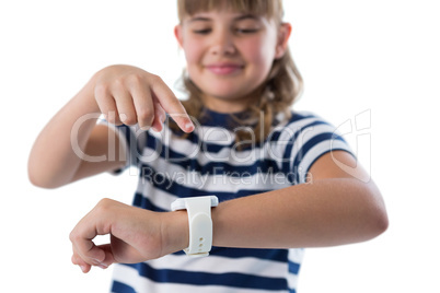 Close-up of girl using smartwatch