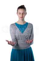 Teenage girl pretending to hold invisible object