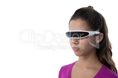 Teenage girl using virtual reality glasses