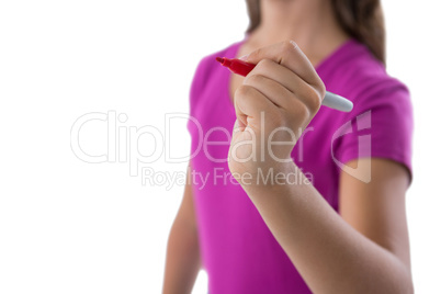 Teenage girl pretending to write on invisible screen