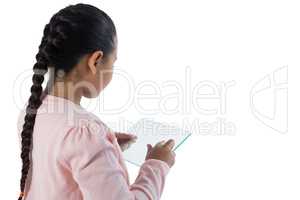 Girl using glass digital tablet