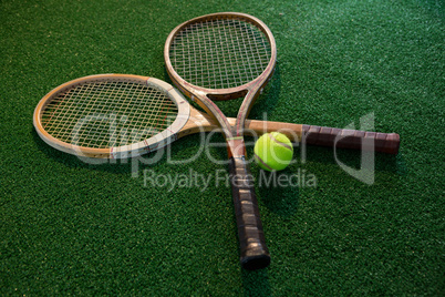 Close up of wooden rackets with tennis ball