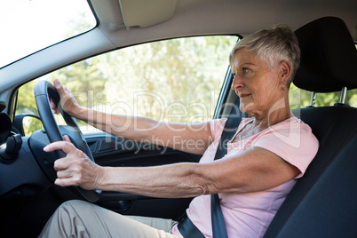 Senior woman driving a car
