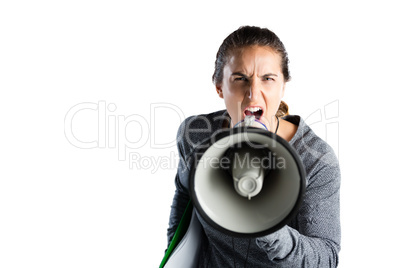 Portrait of young female coach announcing on megaphone