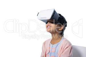 Cute girl using virtual reality glasses