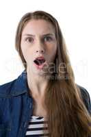 Teenage girl surprised against white background