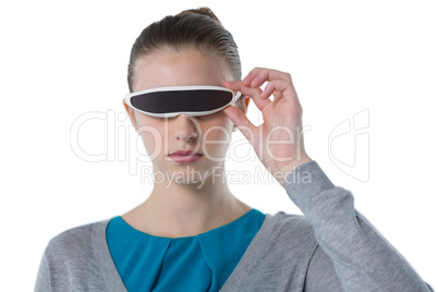 Teenage girl using virtual reality glasses