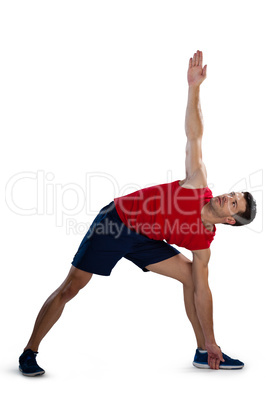 Determined sports player exercising with hand raised