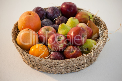 Close-up of various fruits in wicker basket