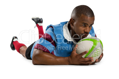Male rugby player scoring a try