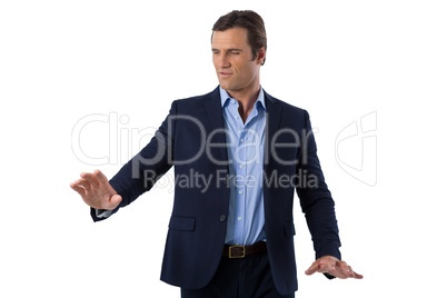 Businessman touching the invisible screen