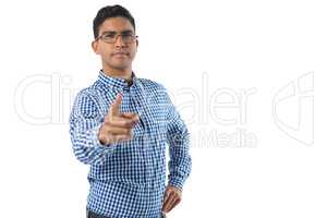 Confident man gesturing against white background