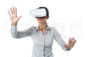 Female executive using virtual reality headset