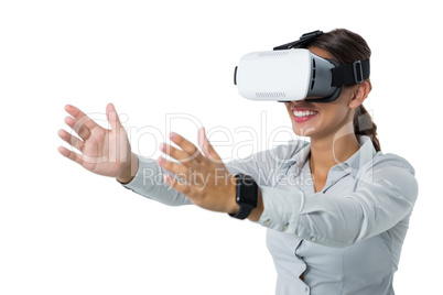 Female executive using virtual reality headset