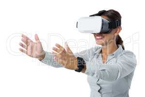 Female executive using virtual reality headset