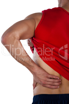 Cropped image of American football player suffering from back pain