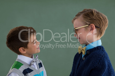 Kids as business executive smiling while standing