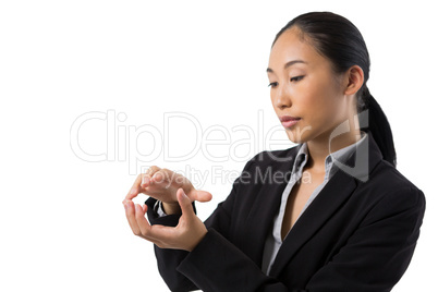 Businesswoman holding invisible object Businesswoman holding invisible object