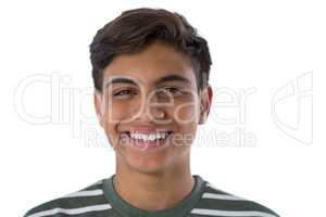 Smiling teenage boy against white background