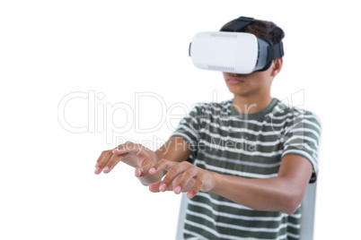 Teenage boy using virtual reality headset