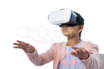 Girl gesturing while using virtual reality headset