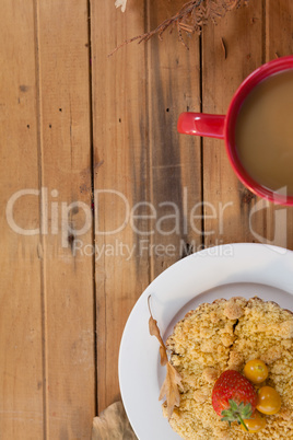 Breakfast plate with coffee mug on table