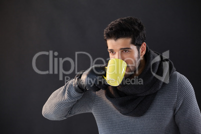 Thoughtful man having a mug of coffee